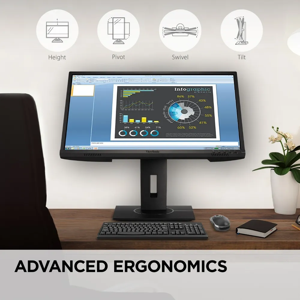 Asztal monitorral, billentyűzettel, egérrel és jegyzetfüzettel, fejlett ergonómia szöveggel.