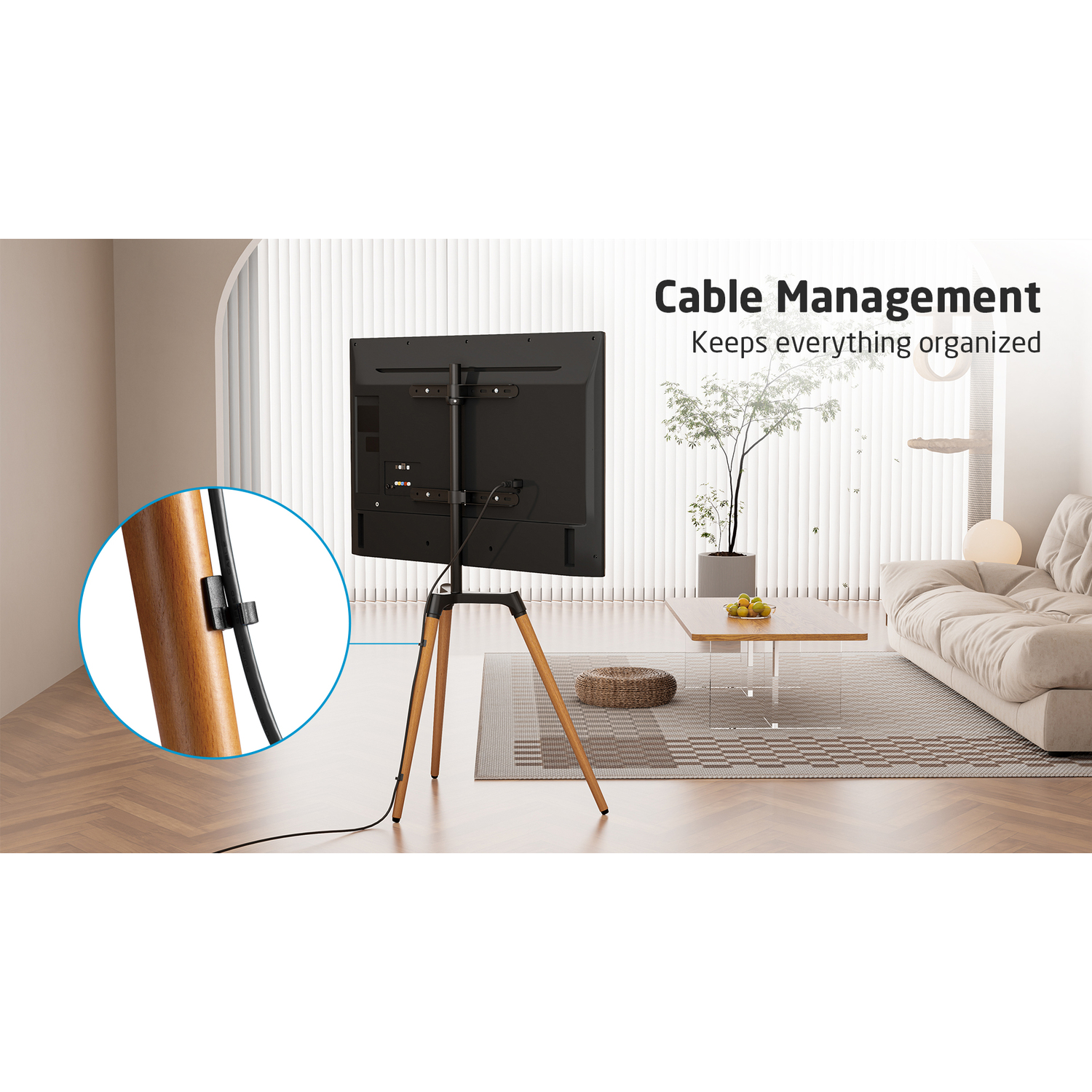 TV op een statief. Het kabelmanagement wordt getoond met een close-up.