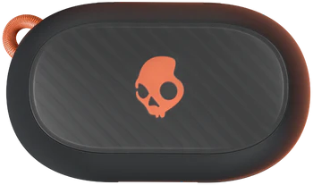 Fekete-narancs Skullcandy hangszóró felülnézete. Narancssárga koponya logó látható.