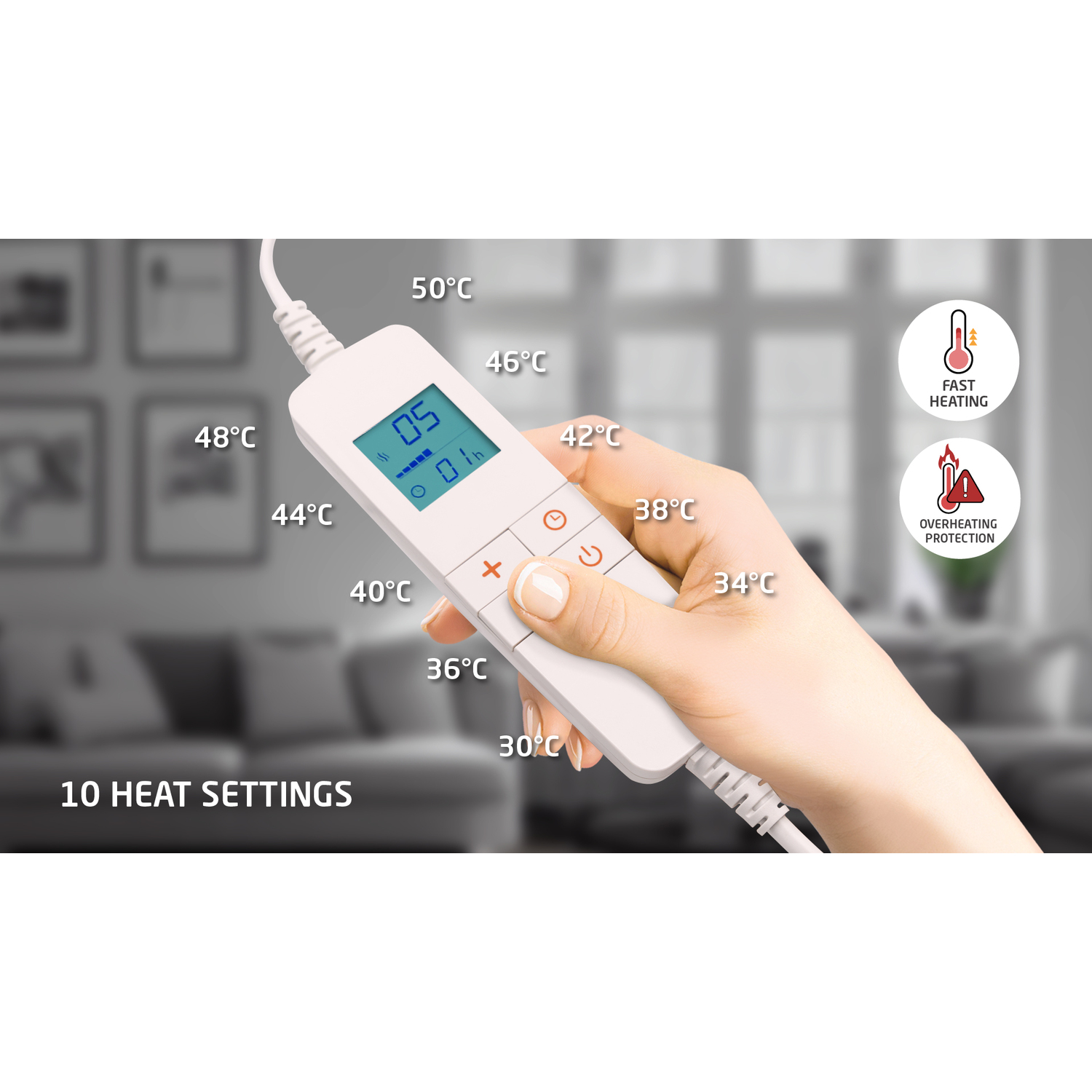 A hand holds a white remote with heat settings and a temperature display.