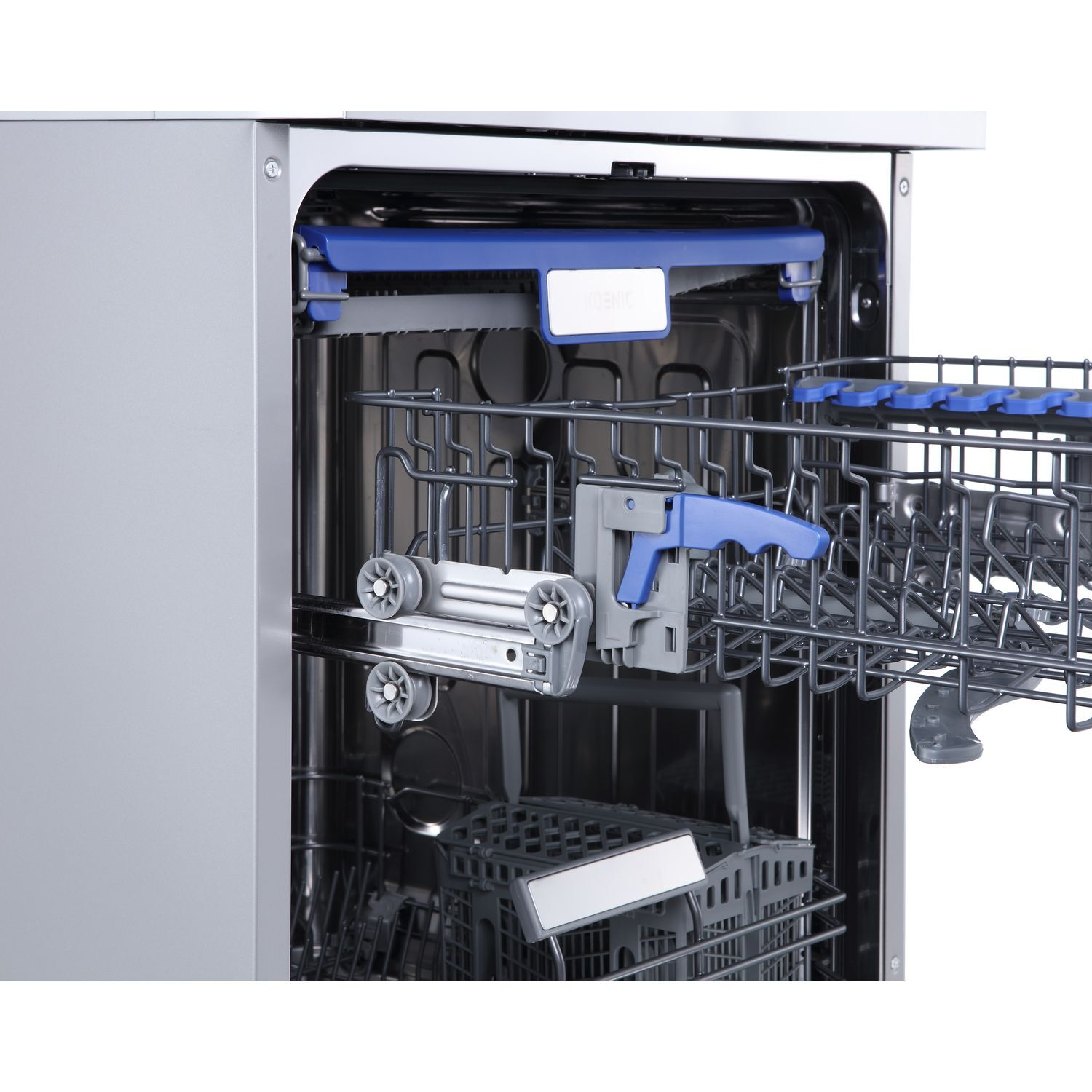 Inside view of a dishwasher, with racks and utensils visible.
