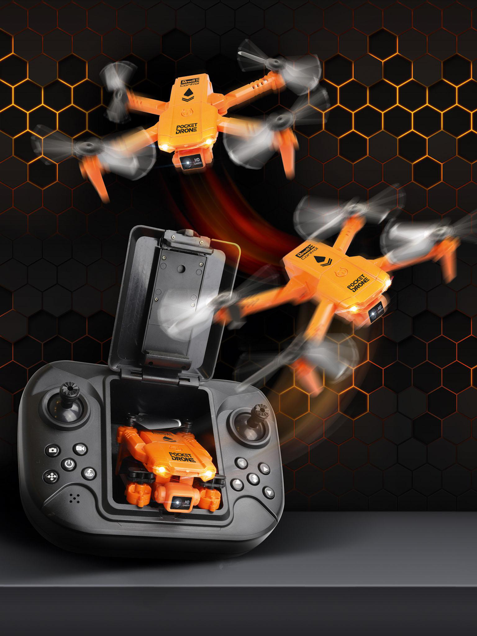 Orange Drohne mit Controller. Drohne ist im Controller und fliegt in der Luft.