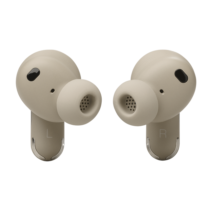 Dos auriculares beige, primer plano, con las letras 'L' y 'R'.