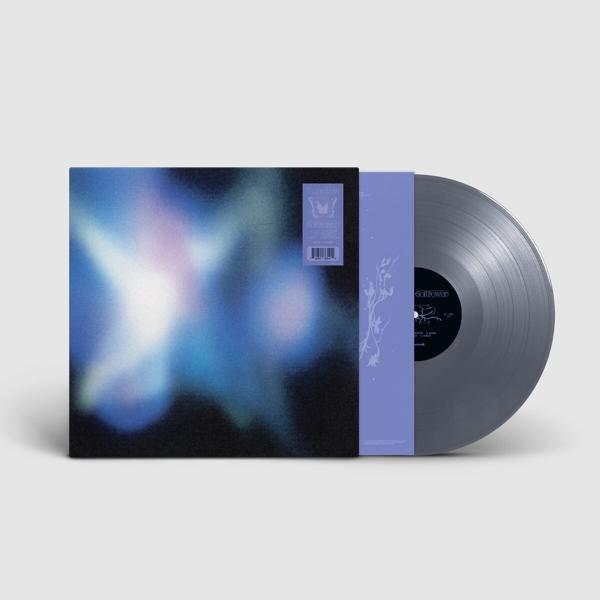 Vinil lemez borítója kék, lila és fehér dizájnnal, ezüst vinil a szélén.