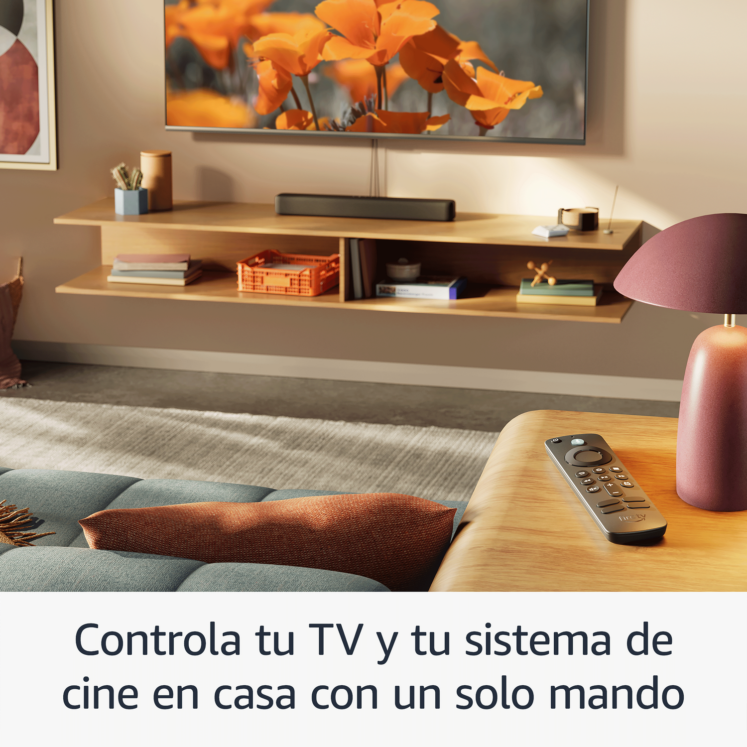 TV en pared, estante flotante con decoración. Mando a distancia en mesa.