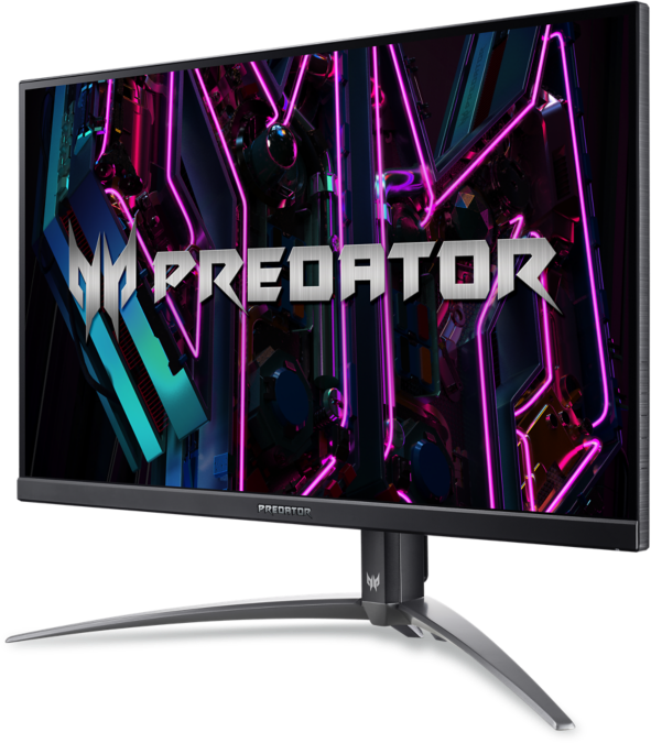 Számítógép monitor a 'PREDATOR' logóval, színes, élénk háttérrel.