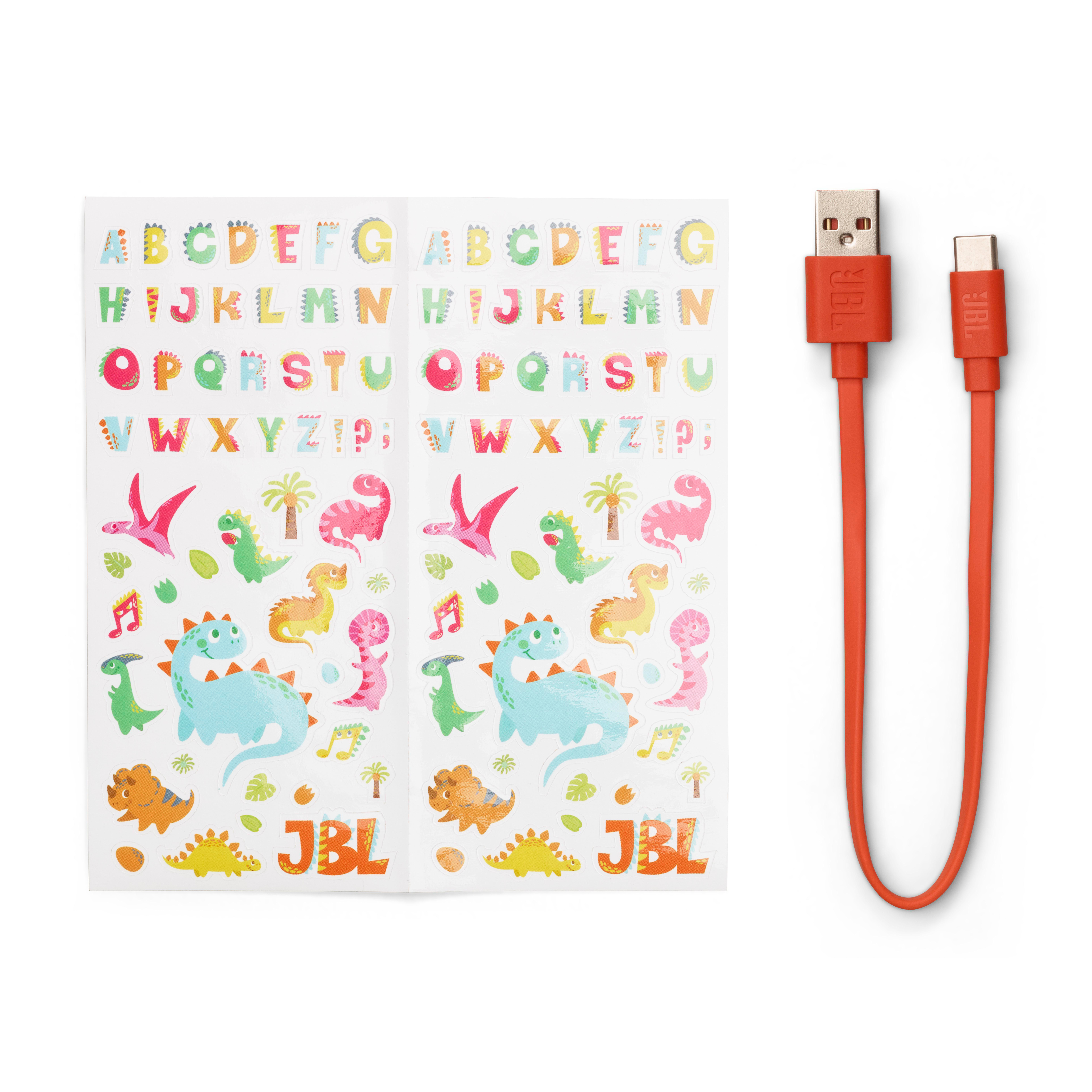 JBL-Aufkleber und ein Ladekabel mit USB- und USB-C-Anschlüssen.