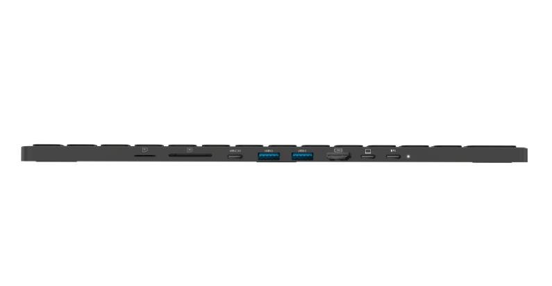 Ein schwarzer USB-Hub mit verschiedenen Anschlüssen, von oben betrachtet.