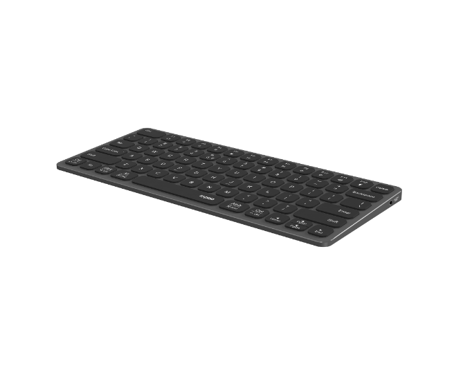 Eine schwarze Roqo-Tastatur mit einer Reihe von Tasten. Sie liegt auf einer weißen Oberfläche.