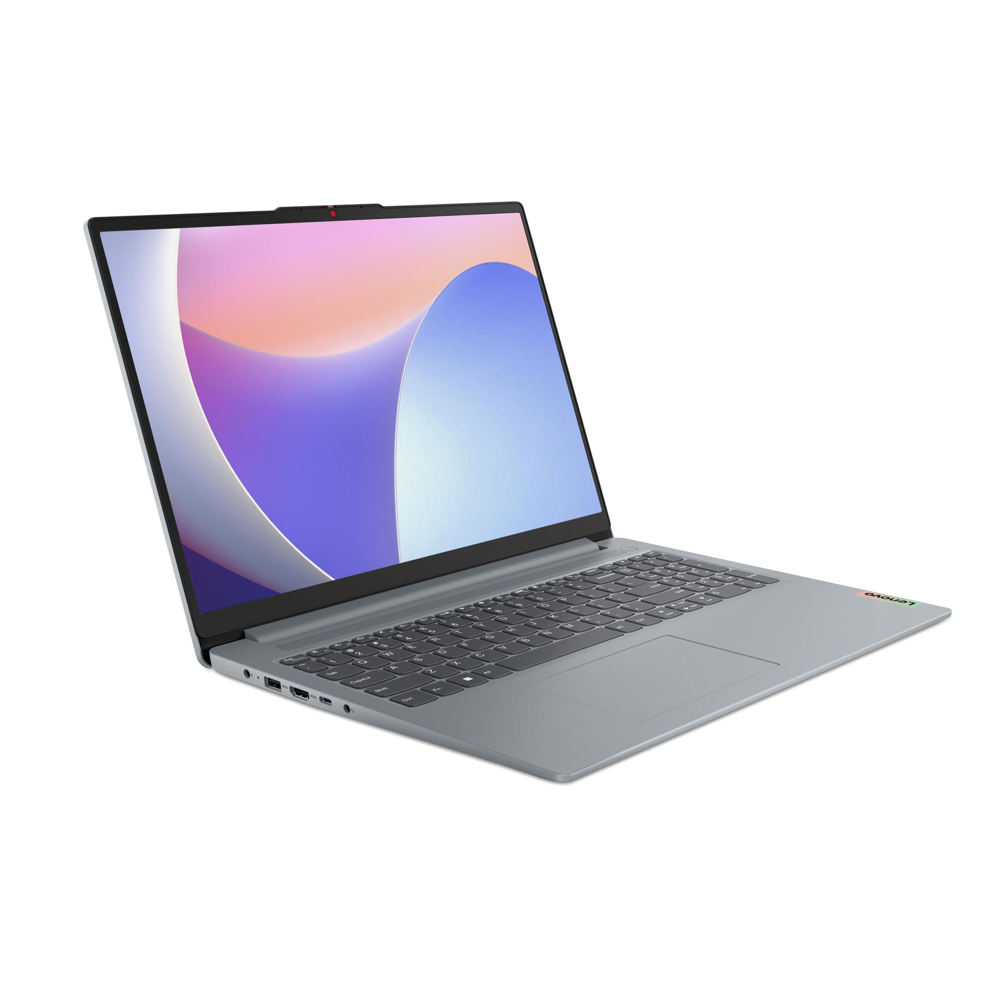 Ein grauer Laptop, abgewinkelt, mit einem Bildschirm mit farbenfrohem Design. Tastatur und Anschlüsse sichtbar.