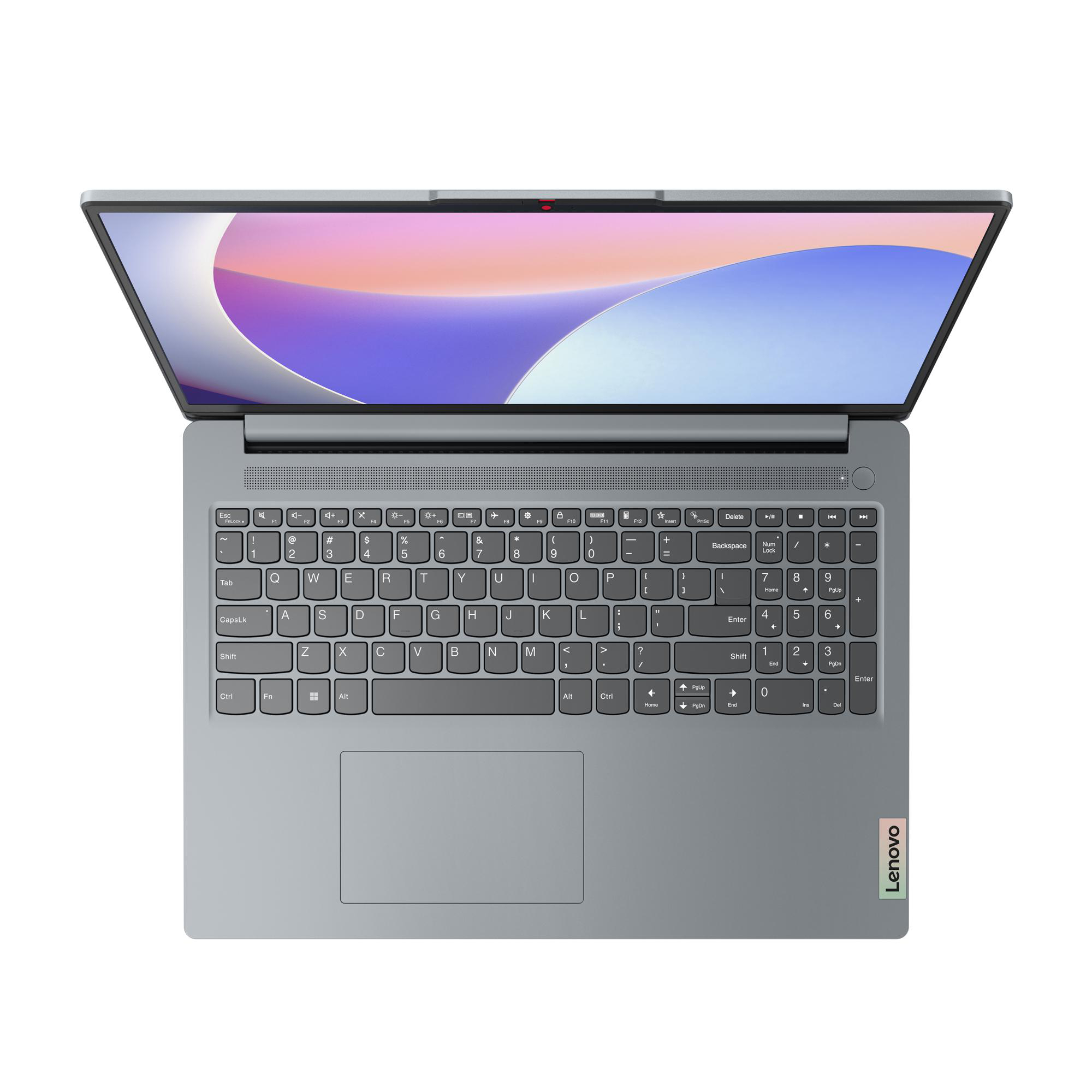 Geöffnetes graues Laptop mit Tastatur, Bildschirm mit Windows-Oberfläche und roter Kamera.