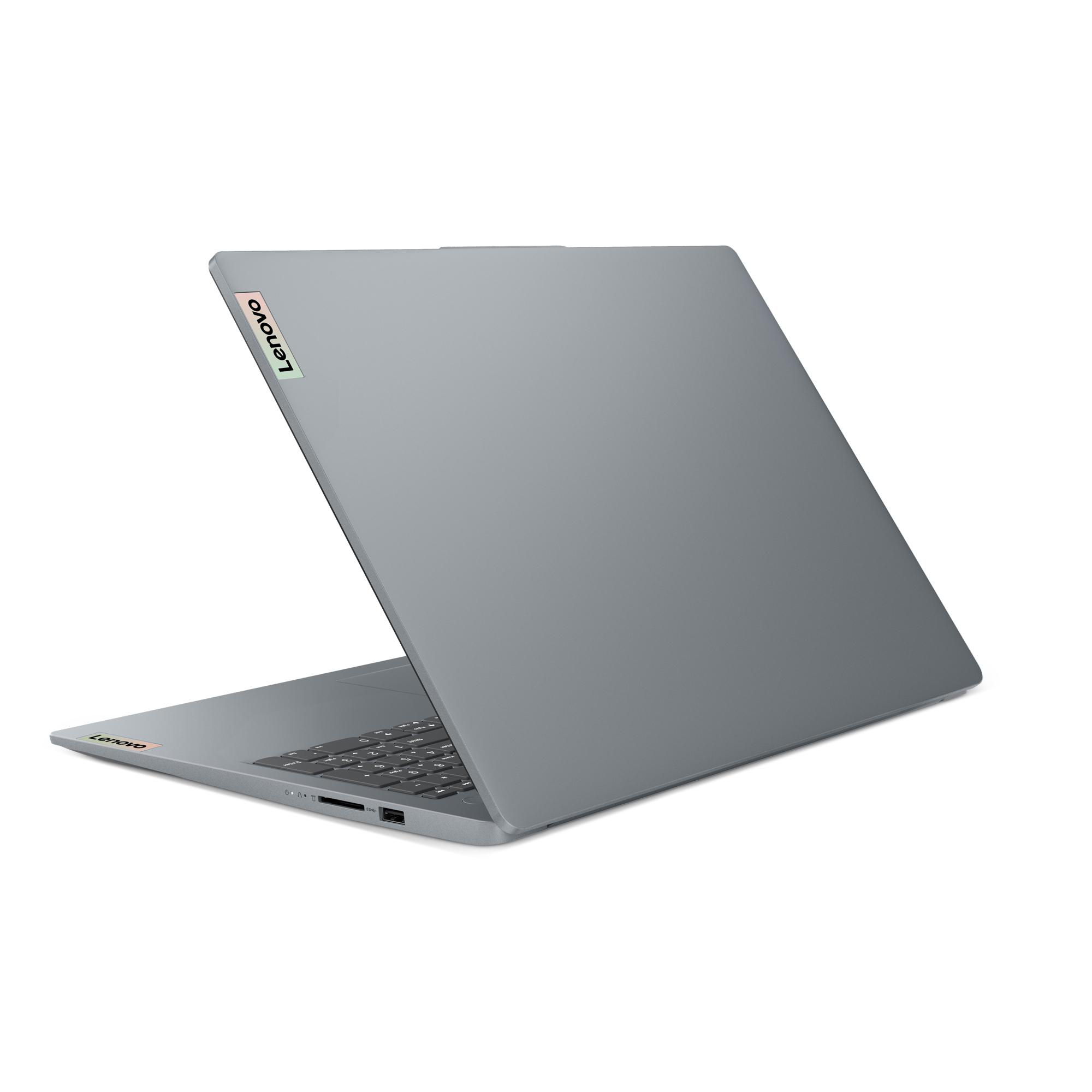 Ein grauer Lenovo-Laptop, geöffnet, angewinkelt, um die Tastatur und das Logo zu zeigen.