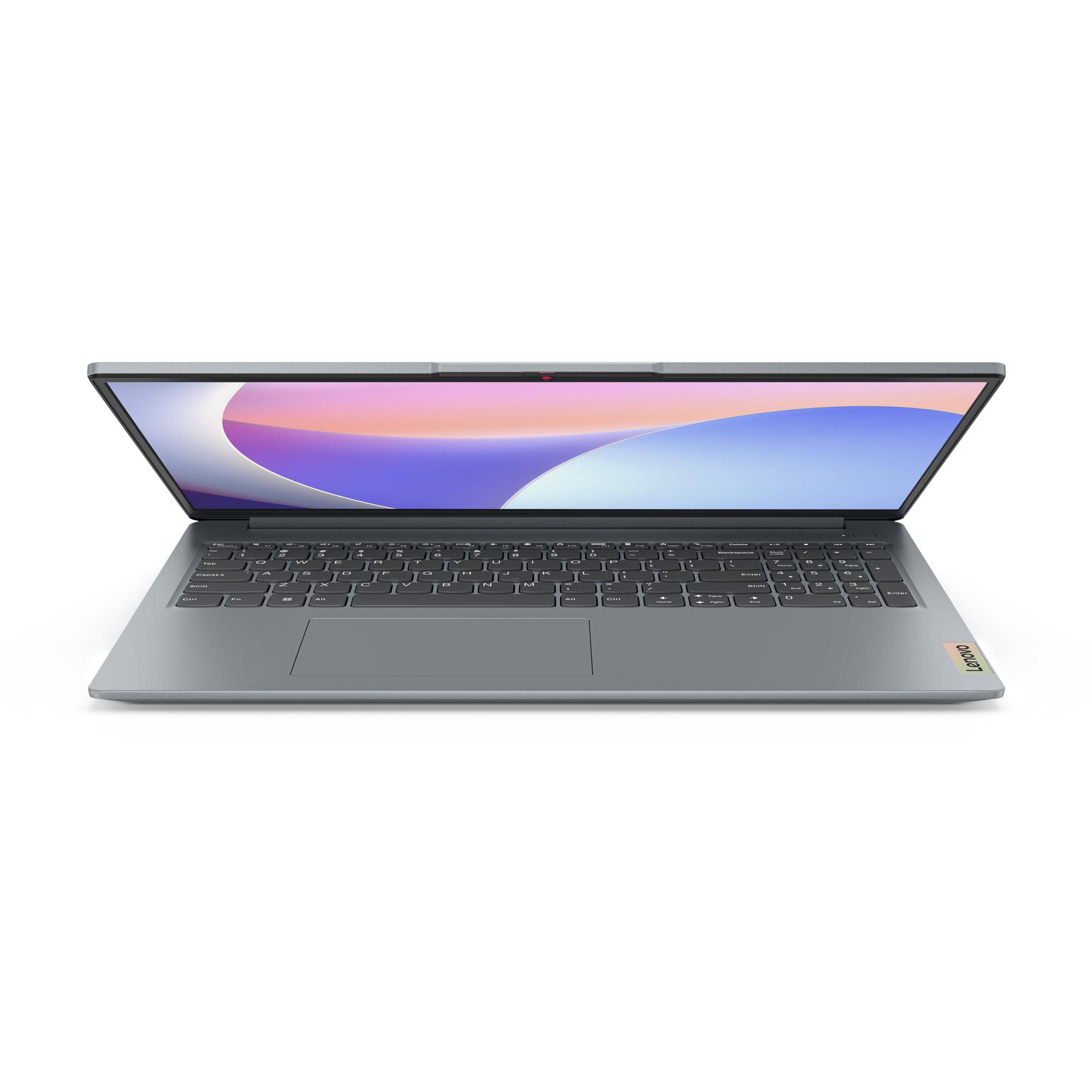 Laptop, offen auf einem Tisch. Graue Tastatur und Bildschirm, Lenovo-Logo. Weißer Hintergrund.