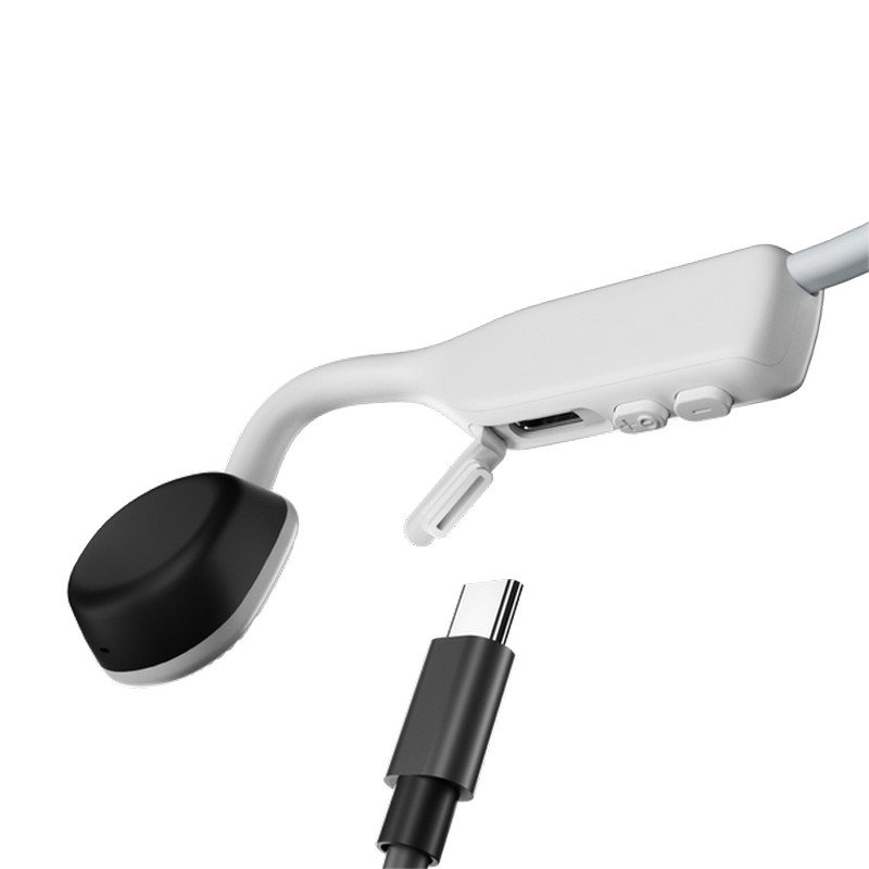 Auricular con cable USB-C. El auricular es blanco y negro.
