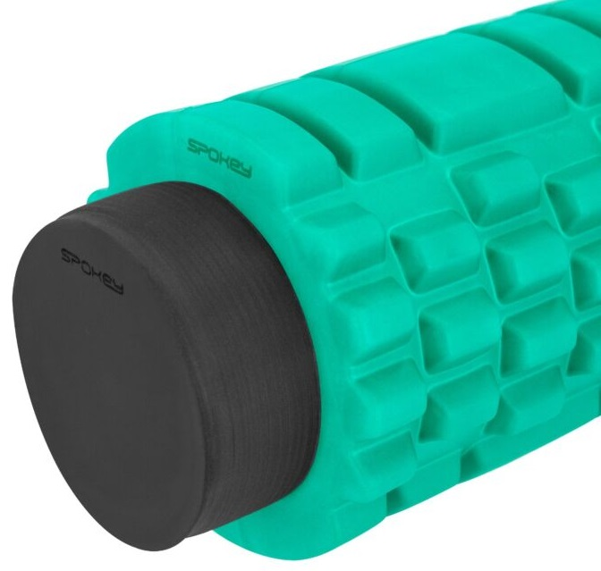 Turkusowy wałek piankowy z czarną zaślepką. Nazwa marki jest na zaślepce.