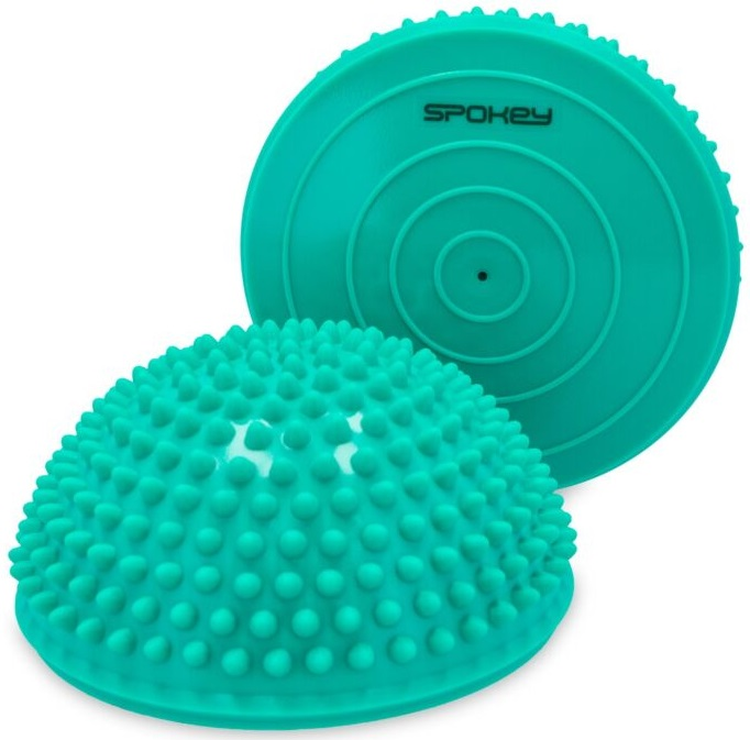 Dwa turkusowe trenażery równowagi. Dolny ma wypustki, górny jest gładki, ze współśrodkowymi okręgami i marką 'Spokey'.