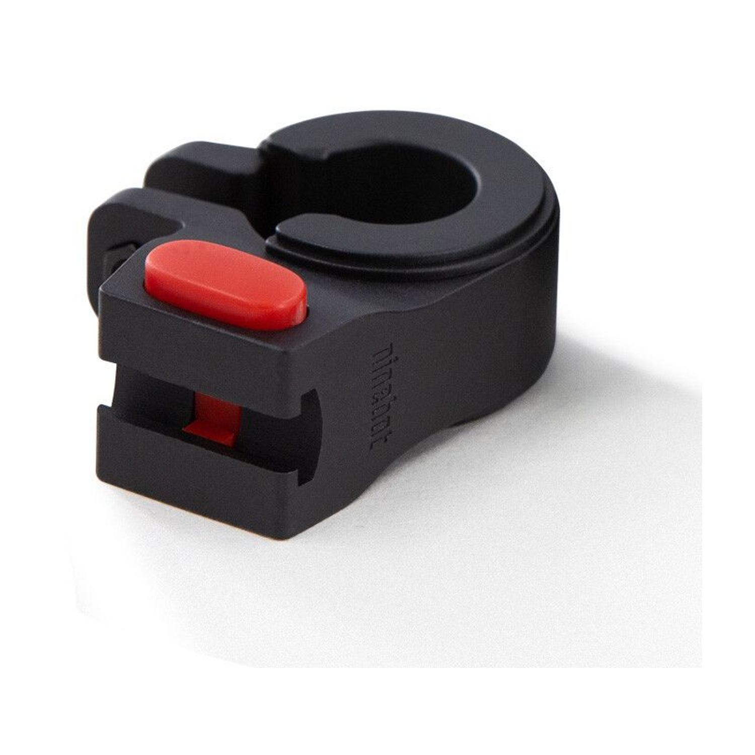 Un dispositivo Ninjadot nero con un pulsante rosso. Il dispositivo è progettato per una bicicletta.