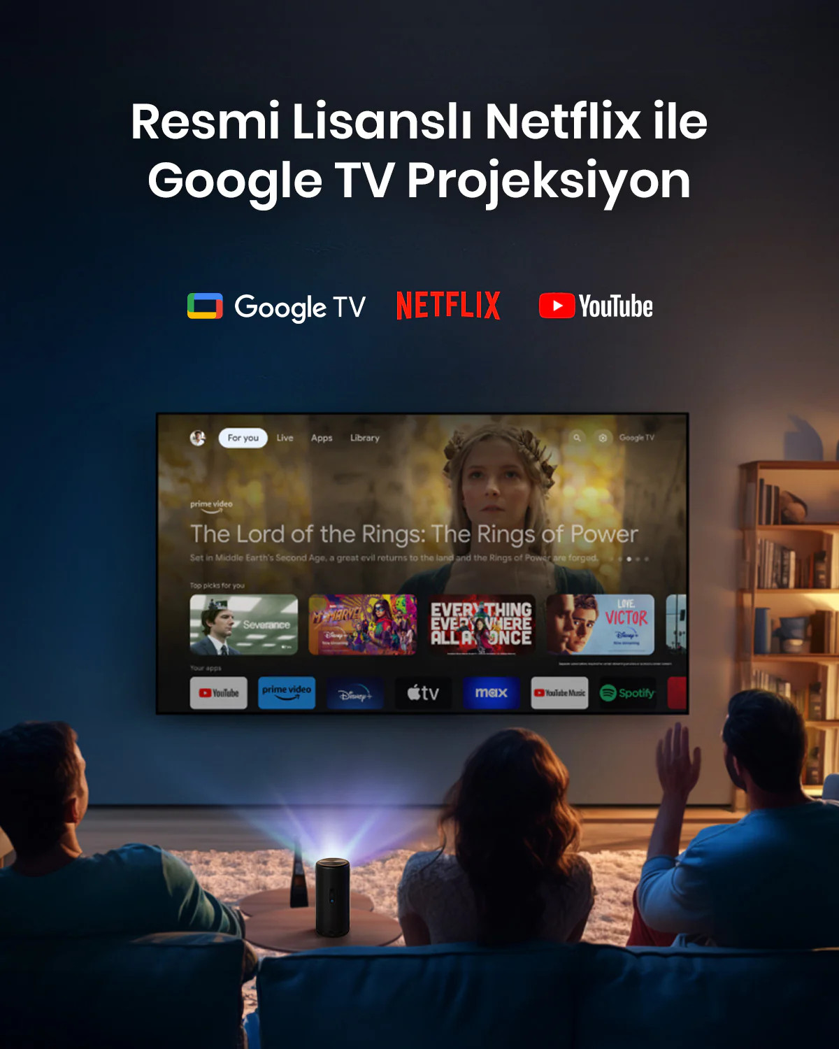 İnsanlar bir projeksiyon perdesinde film izliyor.