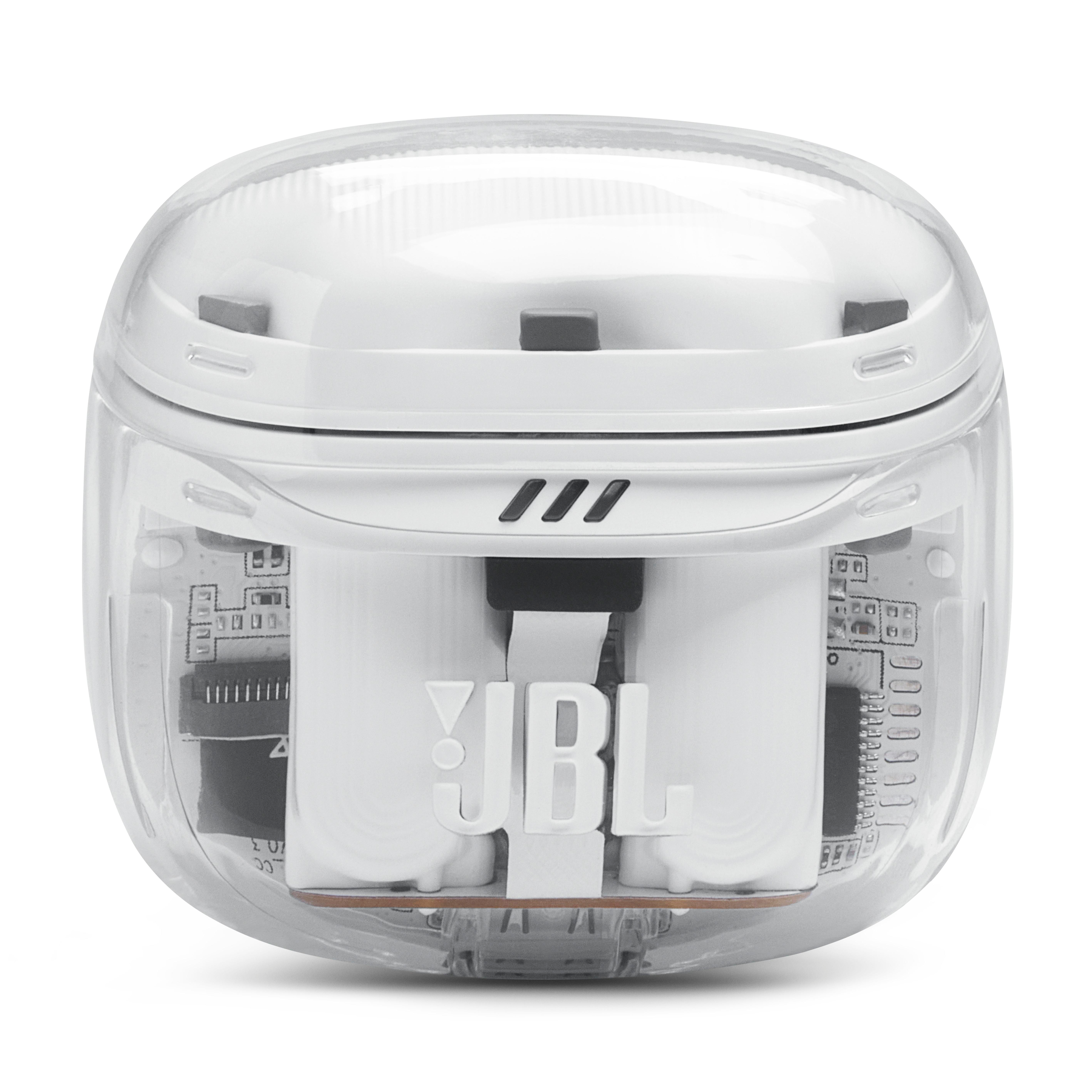 Eine transparente, weiße JBL-Ohrhörerhülle mit internen Komponenten und dem JBL-Logo. Die Hülle liegt auf weißem Untergrund.