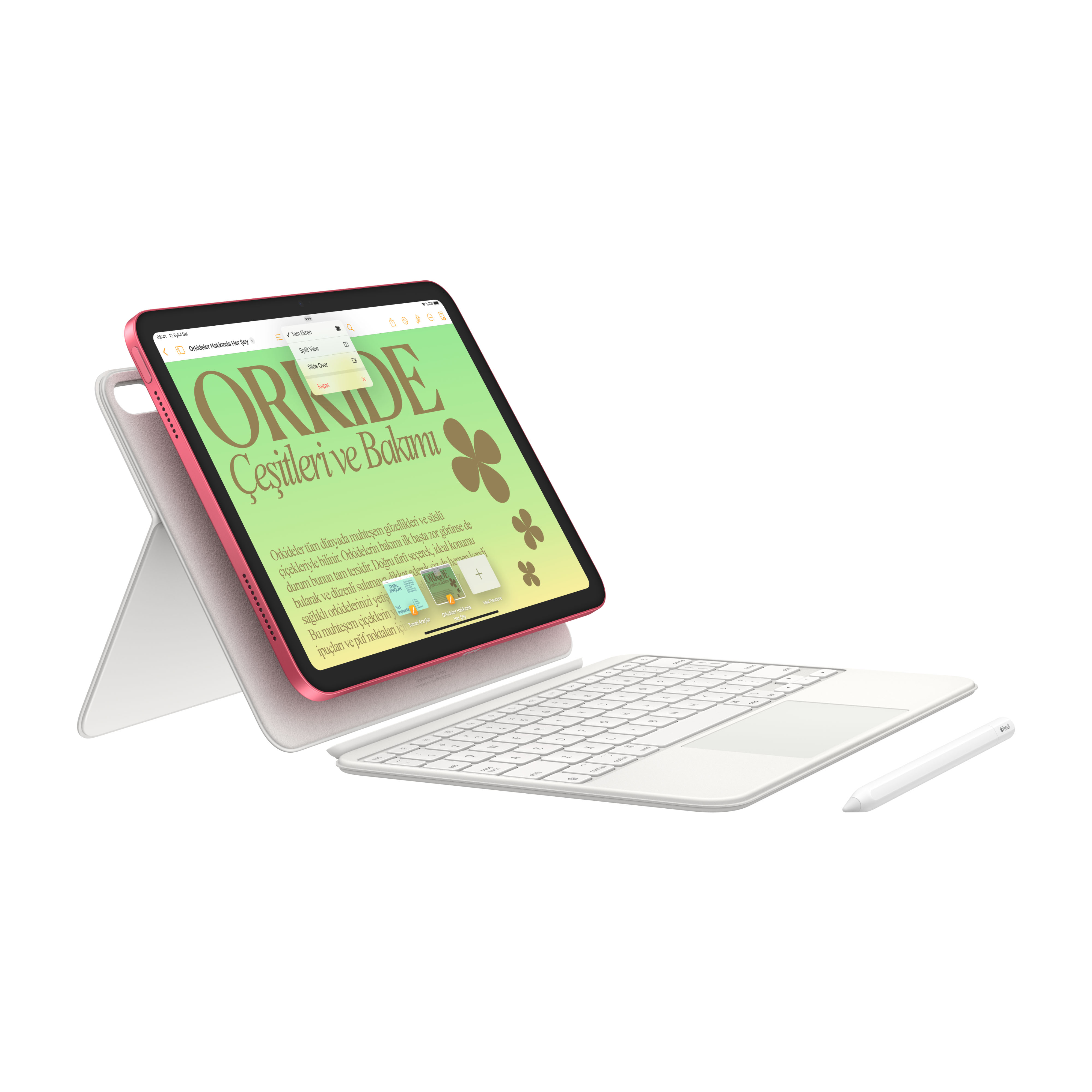 Pembe tablet, klavye ve beyaz kalem. Ekranda metin.