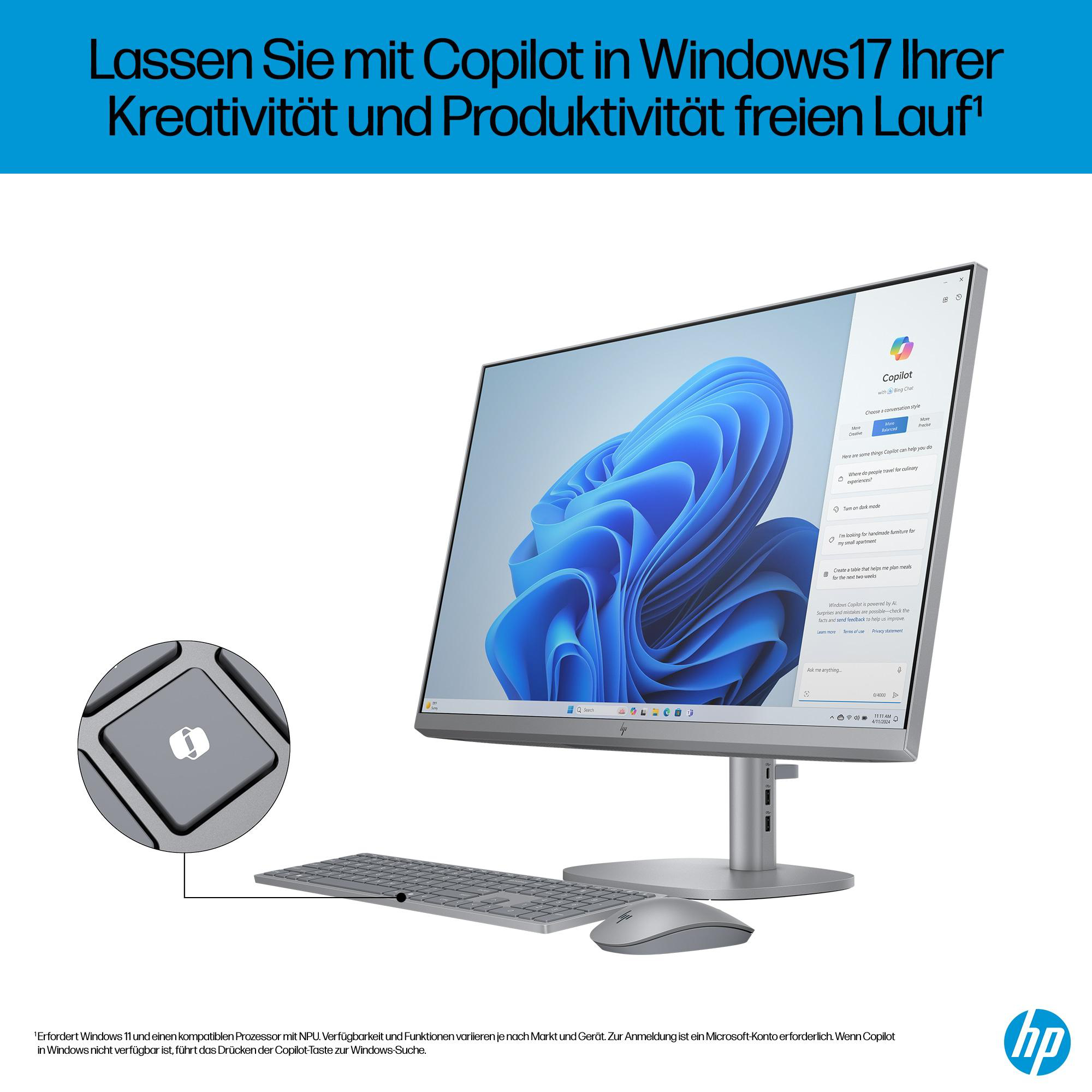 Ein HP All-in-One-Desktop mit Monitor, Tastatur und Maus. Der Bildschirm zeigt eine Copilot-Oberfläche.