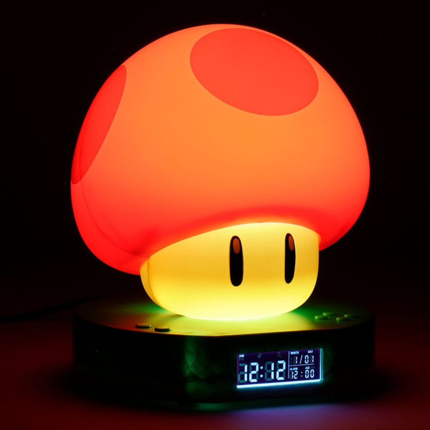 Mushroom shaped lamp with a digital clock. Red cap, yellow base, black stand.