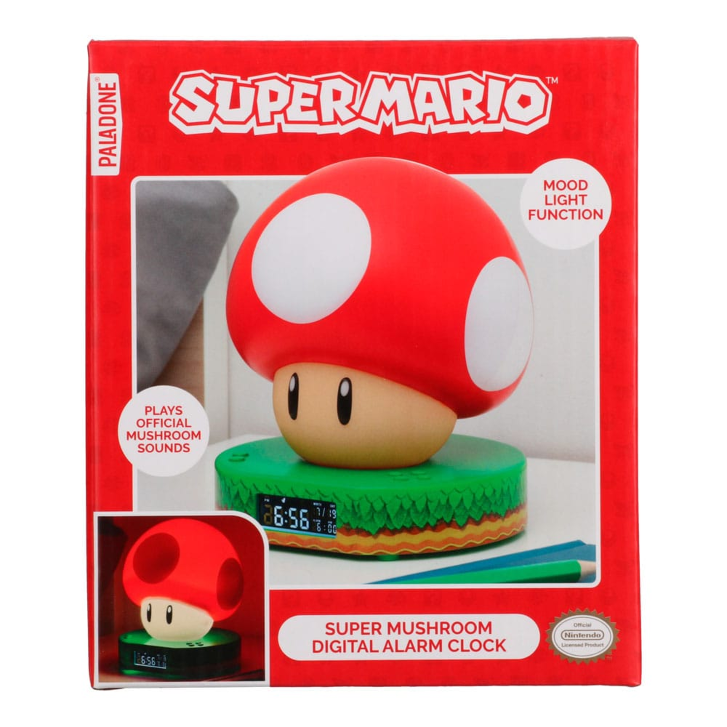 A Super Mario mushroom alarm clock in a red box with text and a picture.