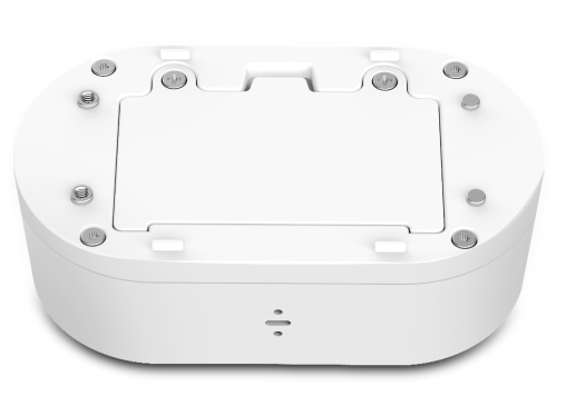 Białe urządzenie ze śrubami na górze. Spód ma mały otwór.