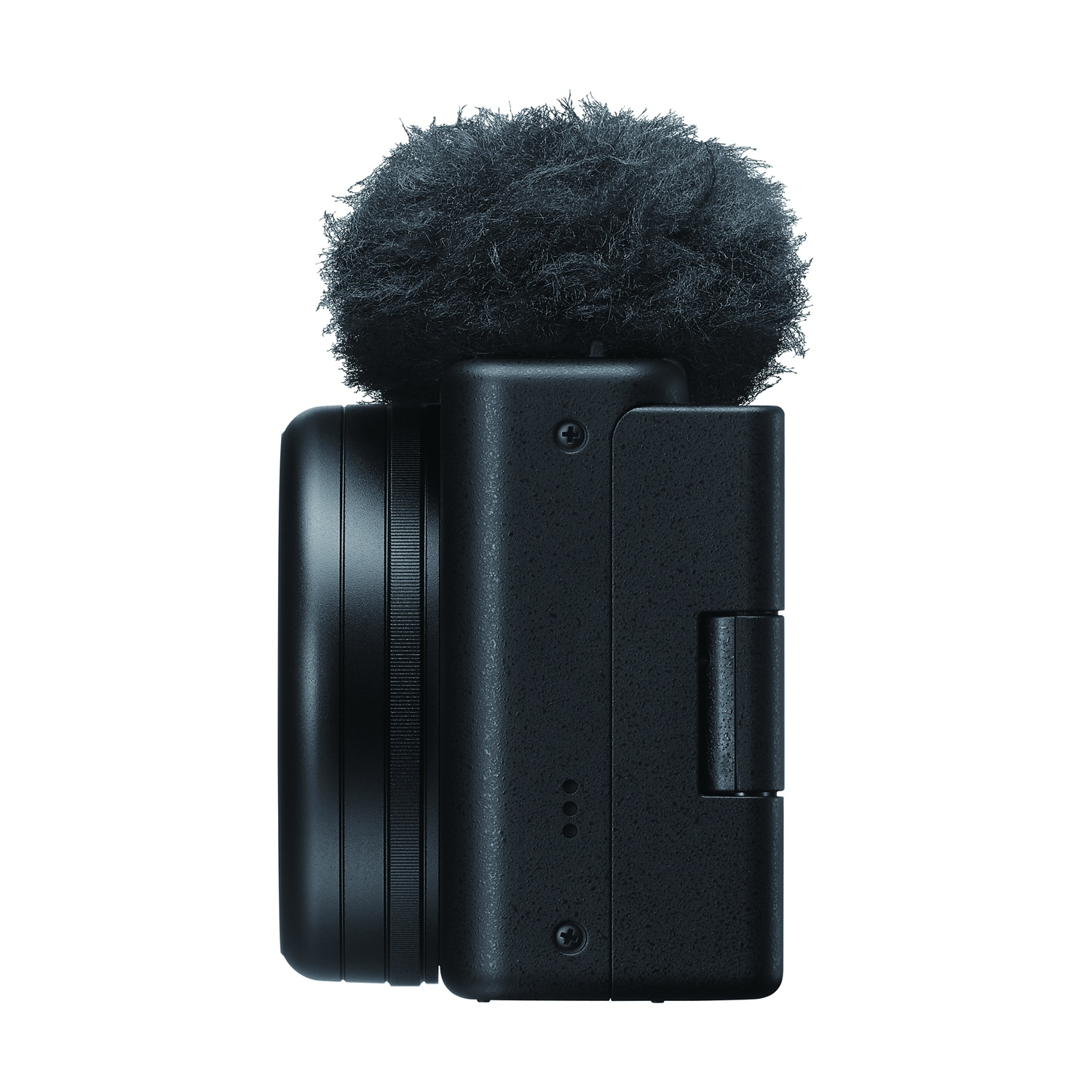 Fotocamera nera con microfono. Il microfono ha una copertura soffice. Su sfondo bianco.