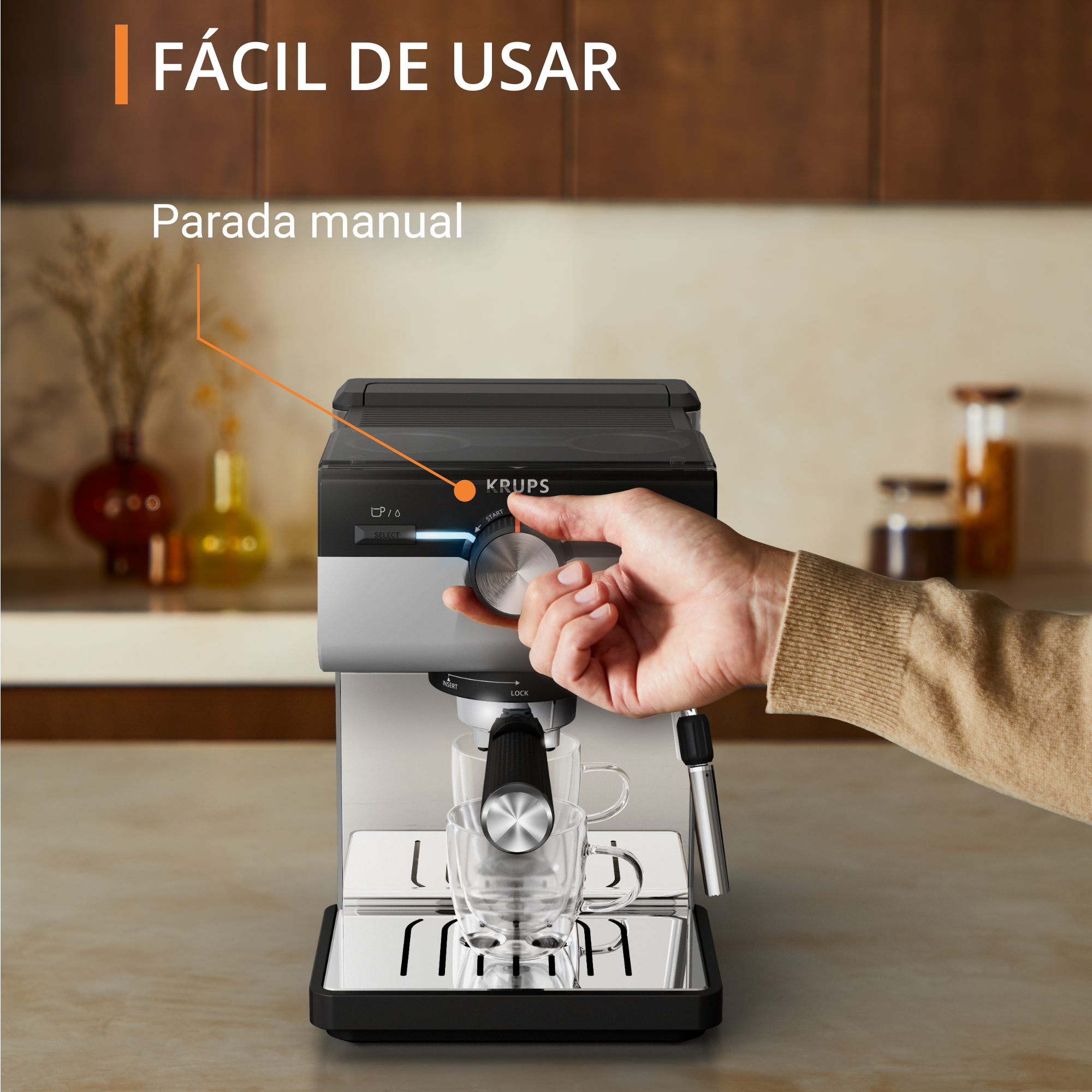 Una máquina de espresso con una mano girando un dial y una taza bajo el surtidor.