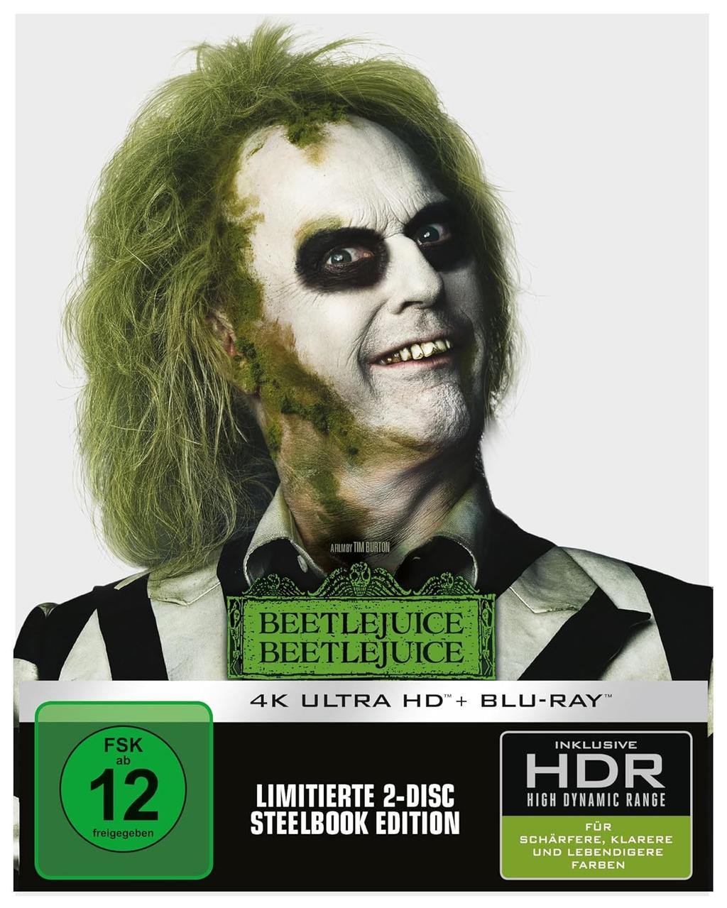 Beetlejuice-Filmcover mit der Figur mit grünen Haaren und einem schwarz-weiß gestreiften Anzug.