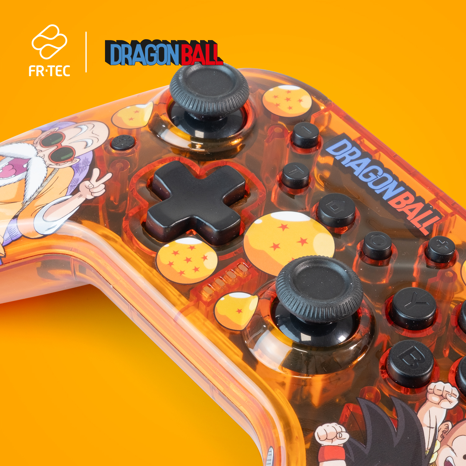 Dragon Ball Controller mit orangefarbenen und schwarzen Knöpfen.