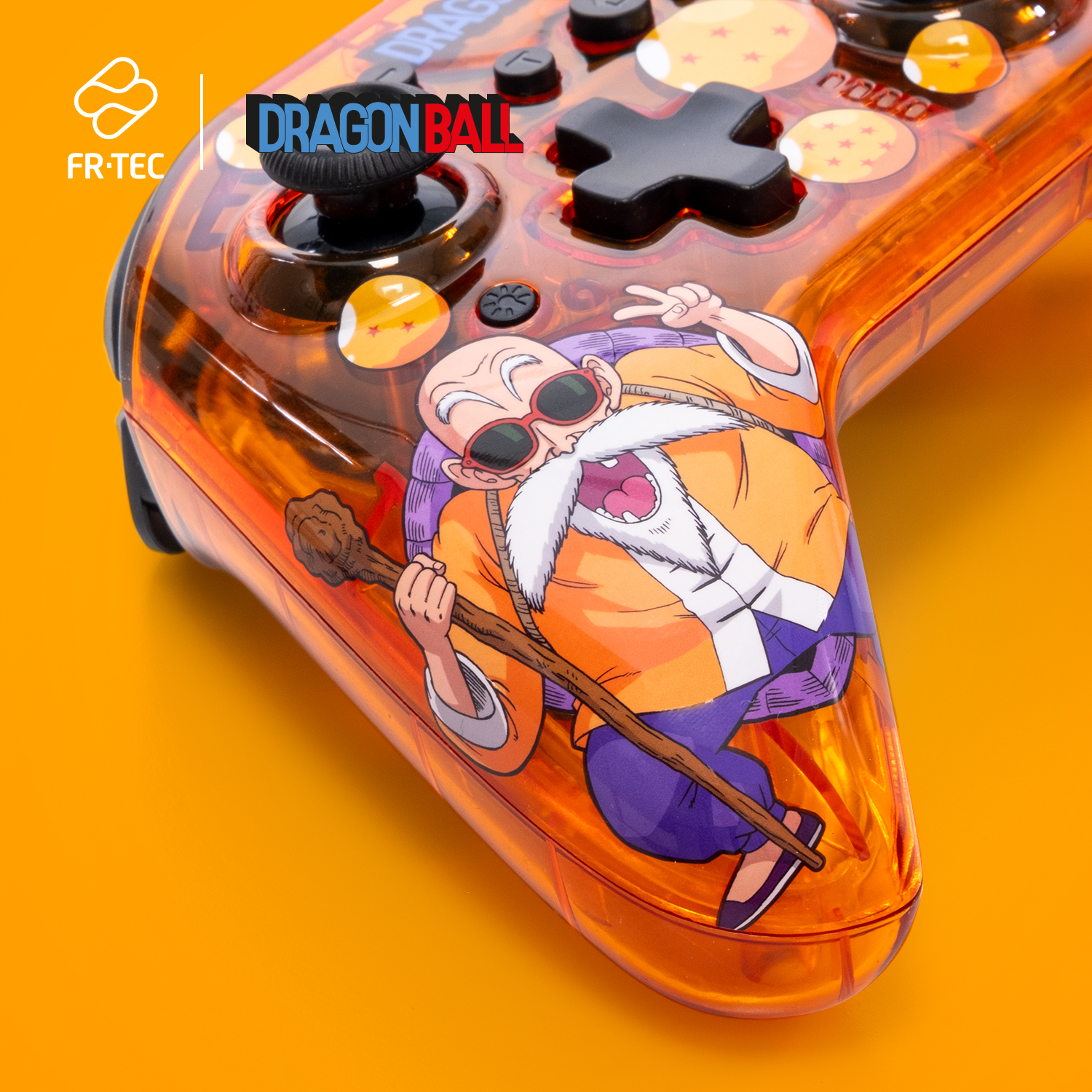 Dragon Ball Controller mit orangefarbenem Design. Mit Master Roshi Kunst, Knöpfen und Joystick.