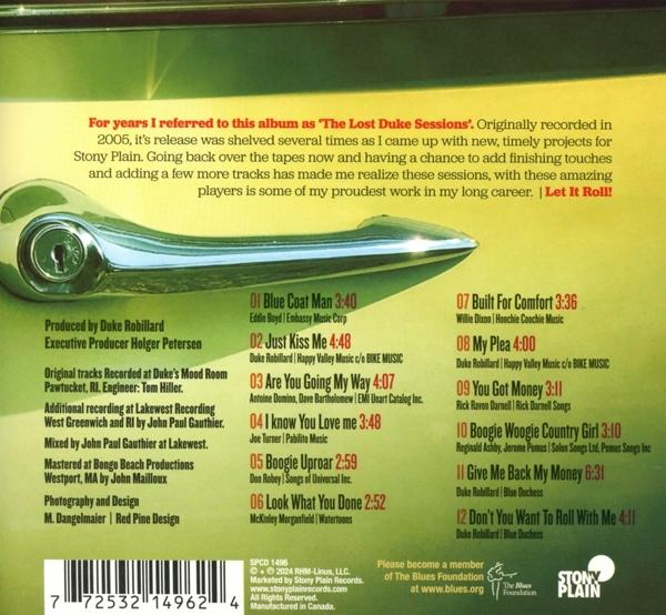 Die Rückseite einer CD-Hülle mit Titelliste und Türgriff.