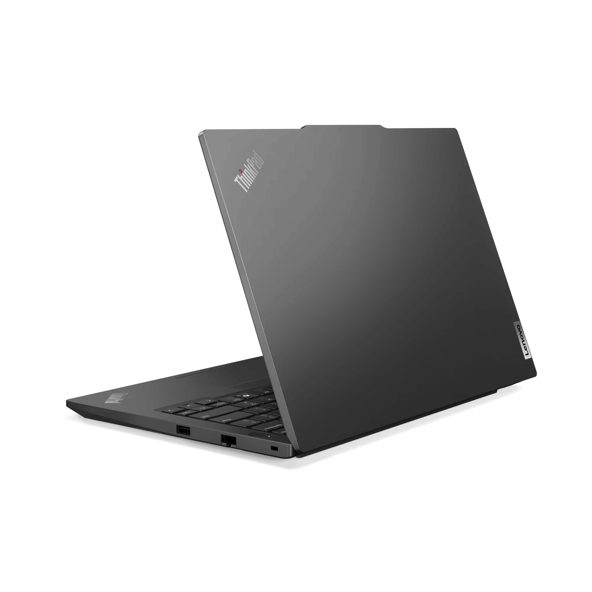 Una computadora portátil gris con el logotipo de Thinkpad está abierta en ángulo sobre un fondo negro.