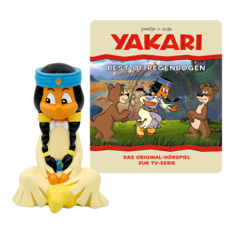 Une figurine Yakari et une couverture de livre avec des illustrations d'animation.