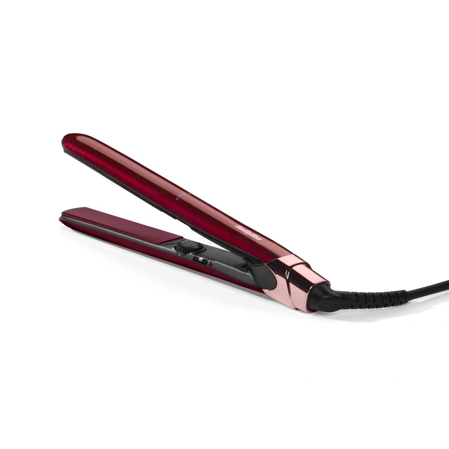 Red and rose gold hair straightener with power cord.