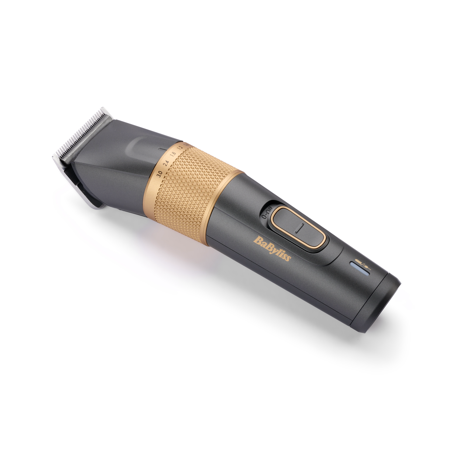 A gray and gold hair clipper on a white background, branded BaByliss.