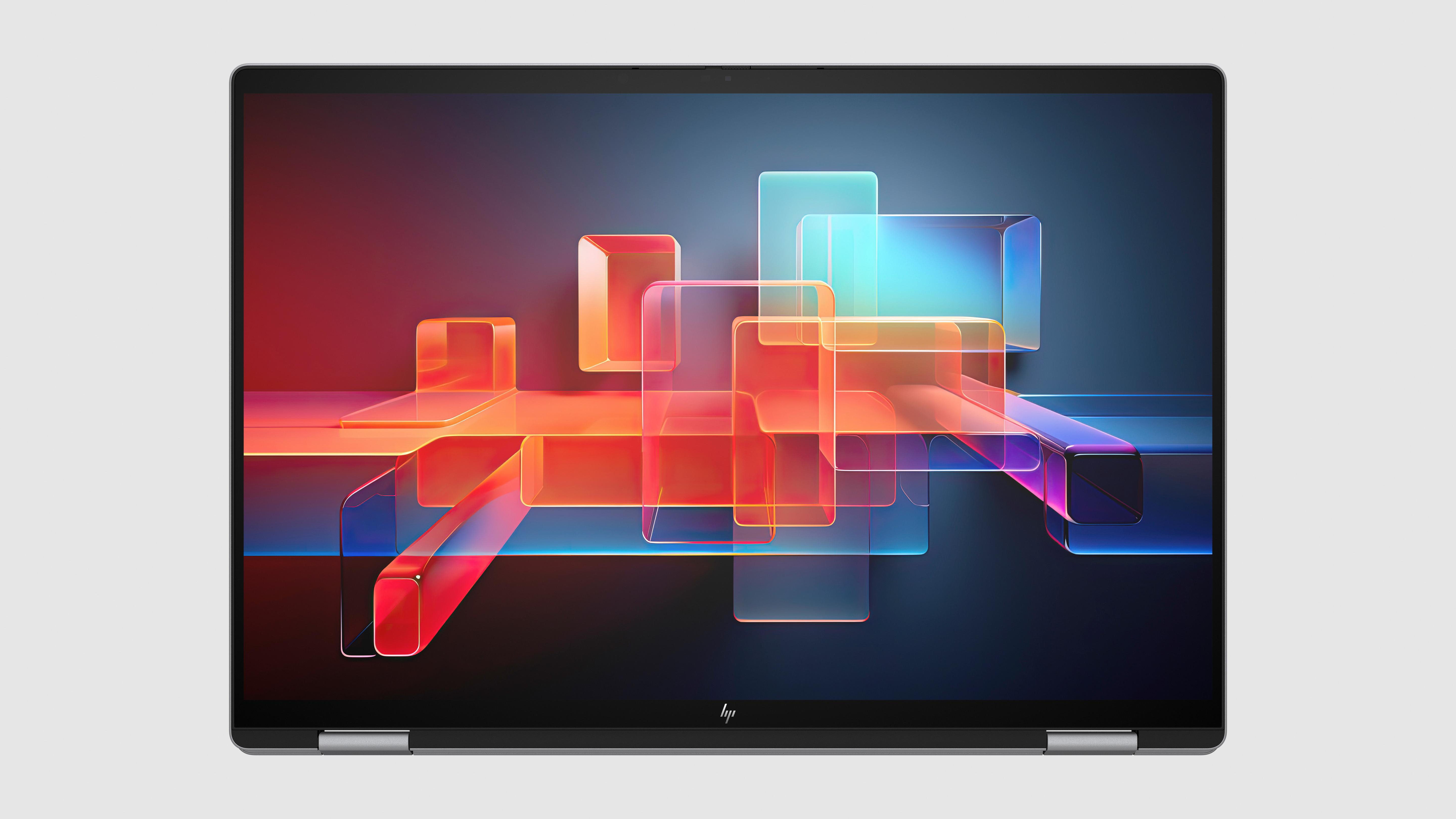 Ein Laptop mit einem abstrakten Design auf dem Bildschirm. Das Design ist rot, orange und blau.