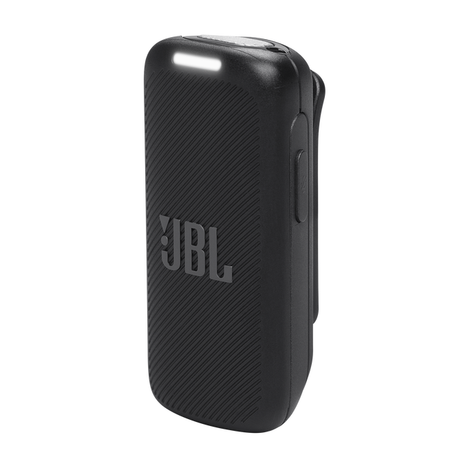 Altavoz JBL negro con superficie texturizada. El logotipo de JBL es visible.