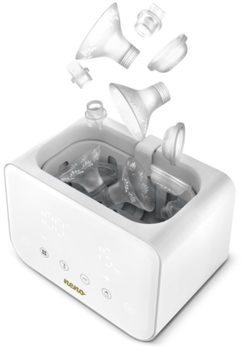 Biało-złota pompa do piersi z częściami w środku dezynfekującym.