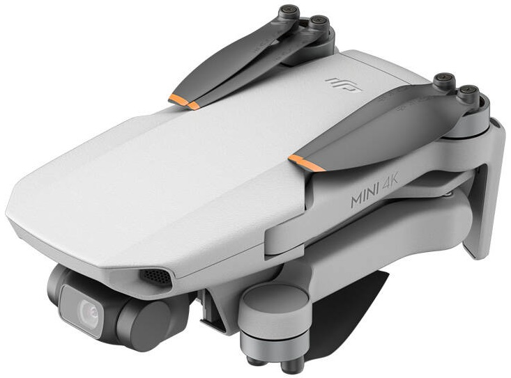 Biały i szary dron z rozłożonymi śmigłami. Etykieta Mini 4K z boku, widok z kąta.