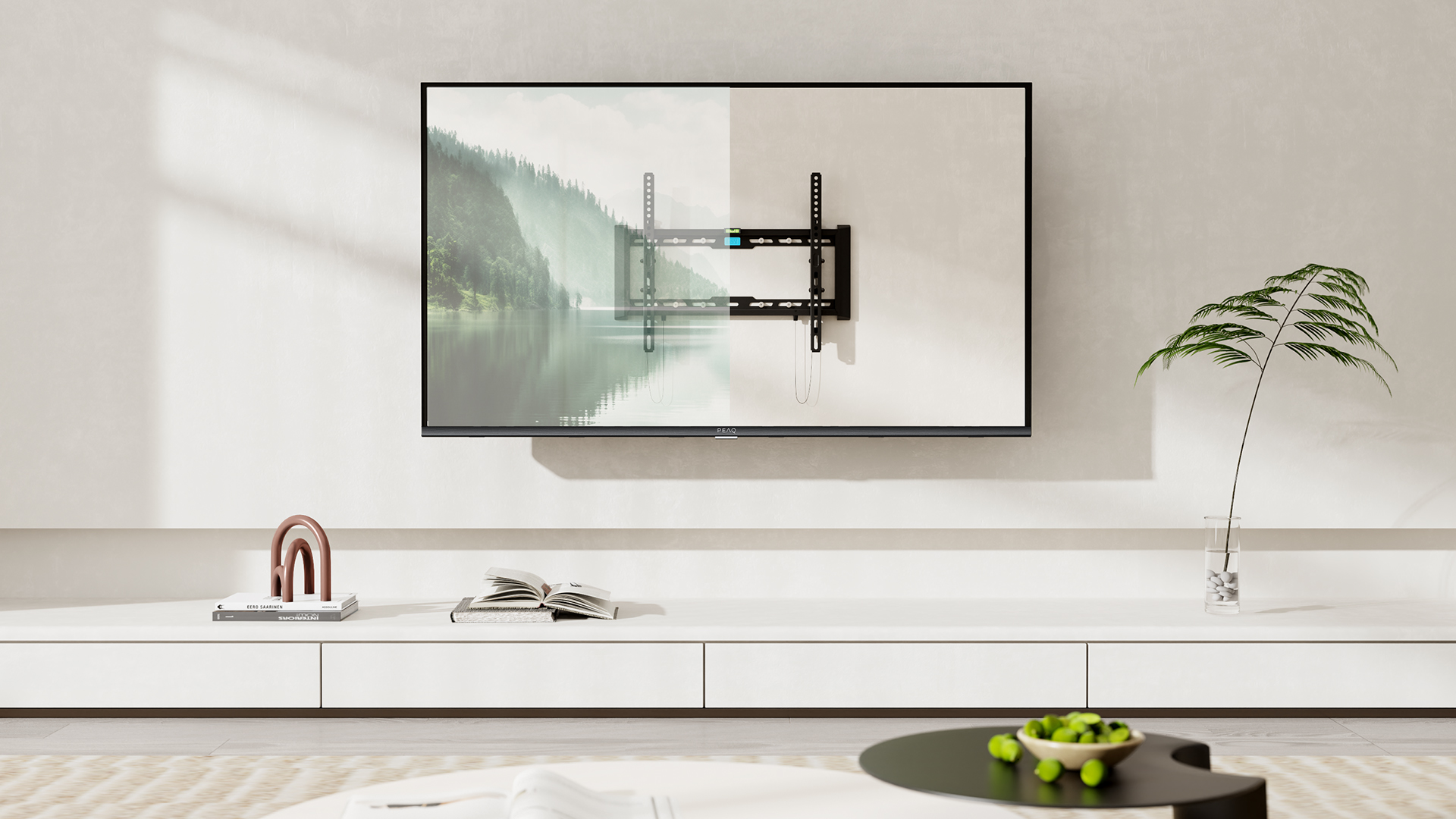 Grande TV murale blanche, support TV noir et meuble blanc en dessous.