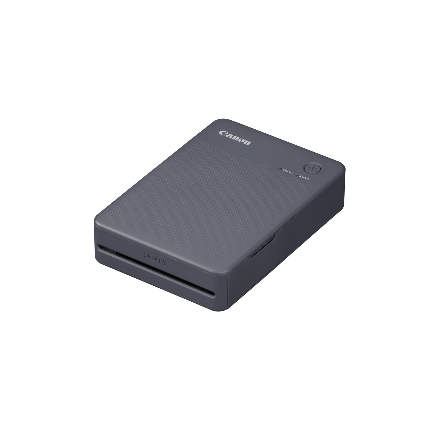 A grey Canon Selphy photo printer, angled slightly. Power and status buttons are visible.