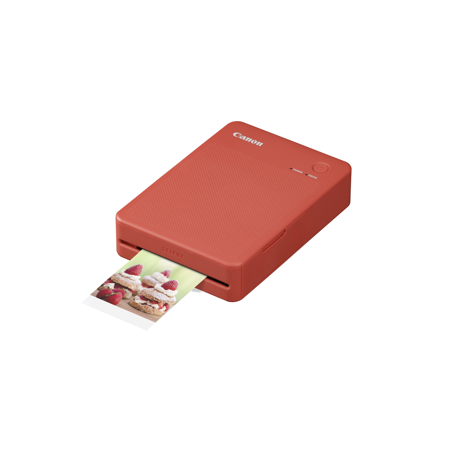 A red Canon printer with a photo of a dessert, on a white background.