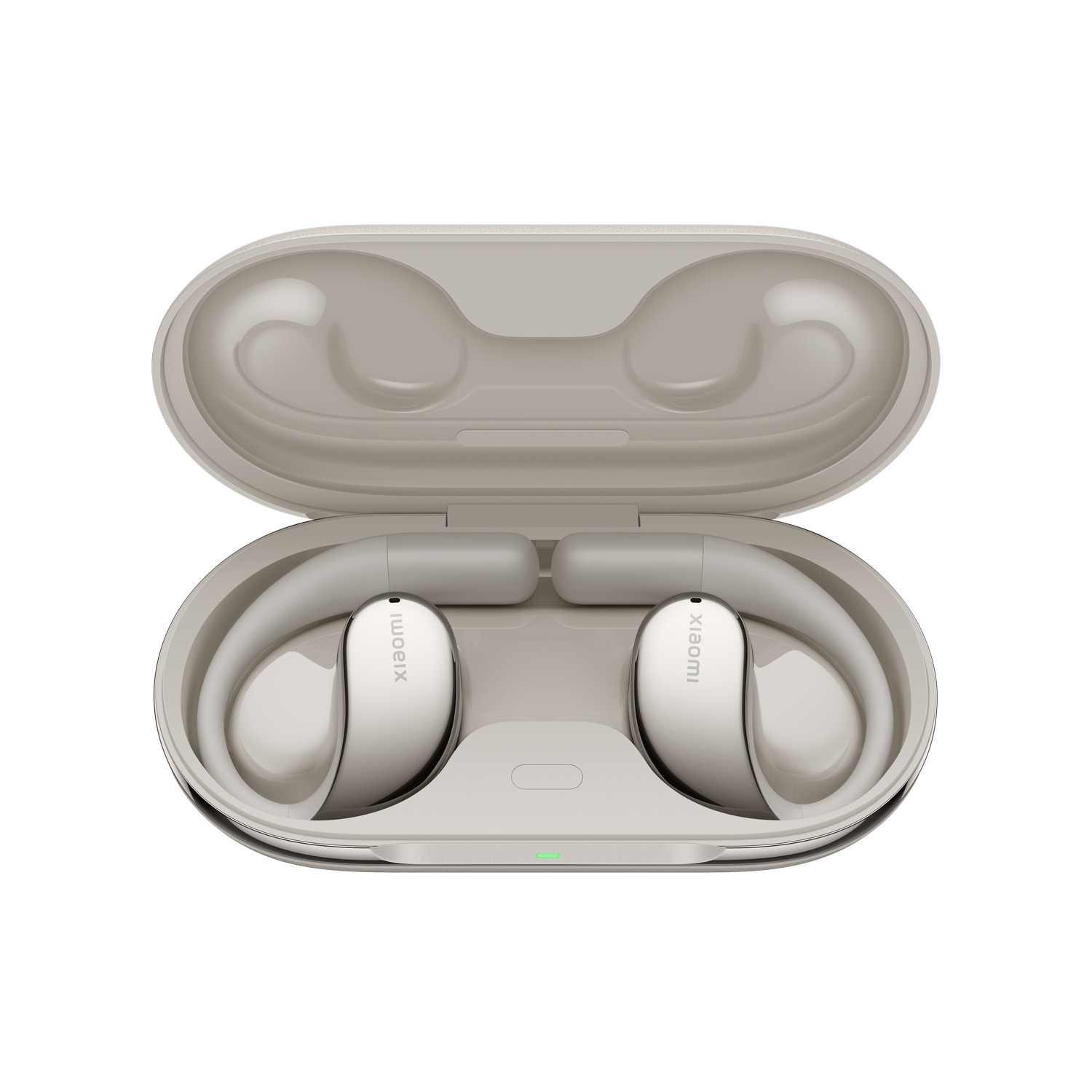 Par de auriculares Xiaomi grises y beige en un estuche de carga. El estuche está abierto.