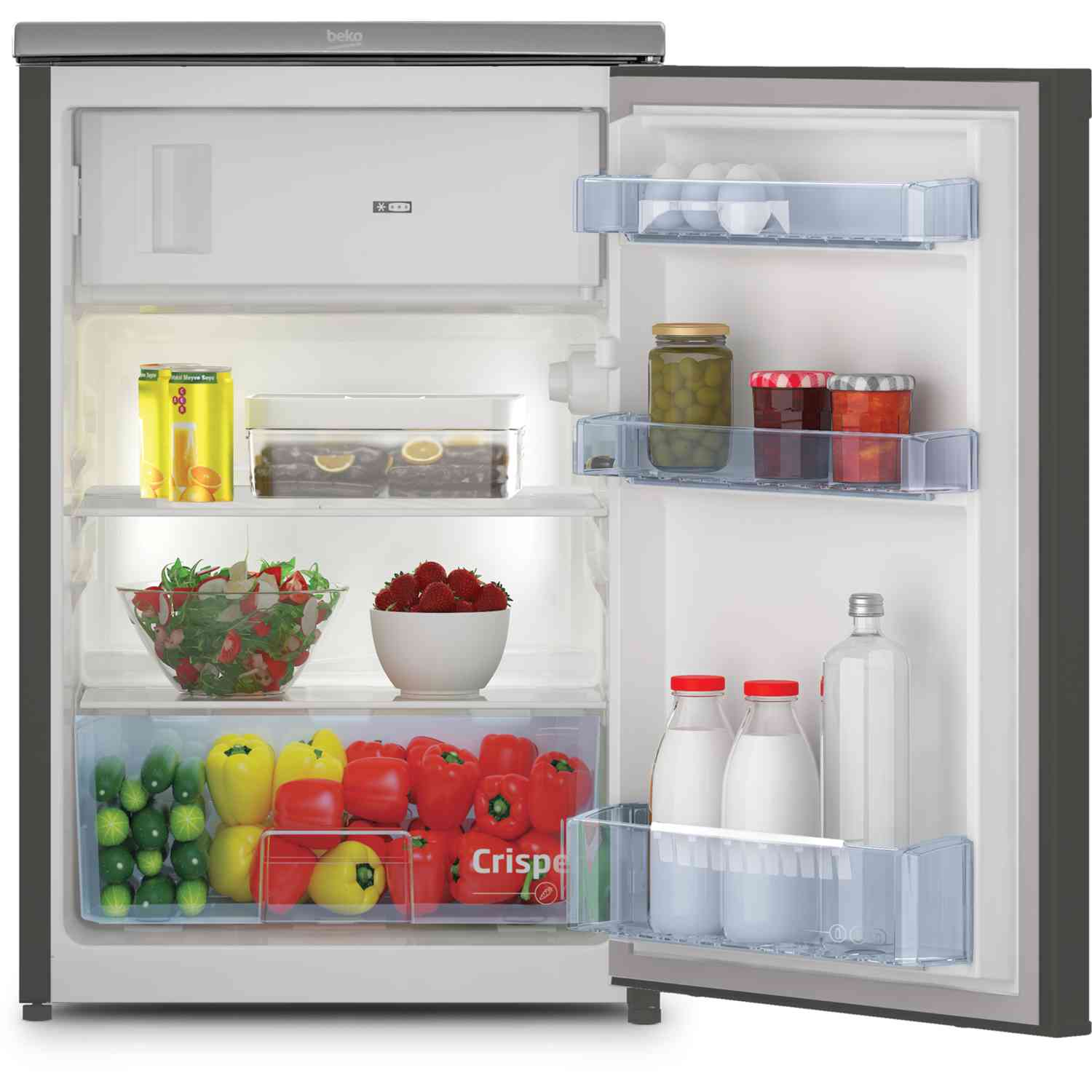 Réfrigérateur ouvert avec divers aliments, légumes et lait.