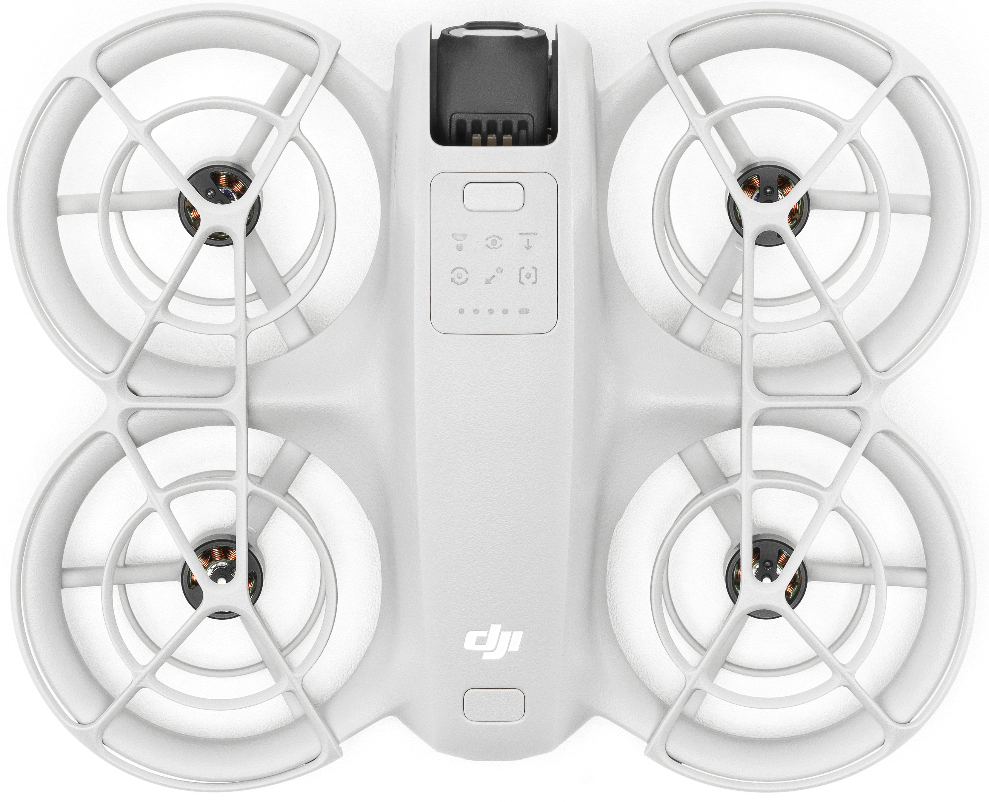 Drone blanc, vue de dessus. Quatre hélices, panneau de commande central avec logo DJI.