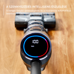 Porszívó kijelző. Digitális kijelzőt mutat, 100-as számmal, kék/piros gyűrűvel.