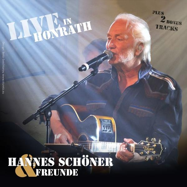 Albumcover eines Mannes, der Gitarre spielt und in ein Mikrofon singt. Text: Hannes Schöner & Freunde, Live in Honrath.